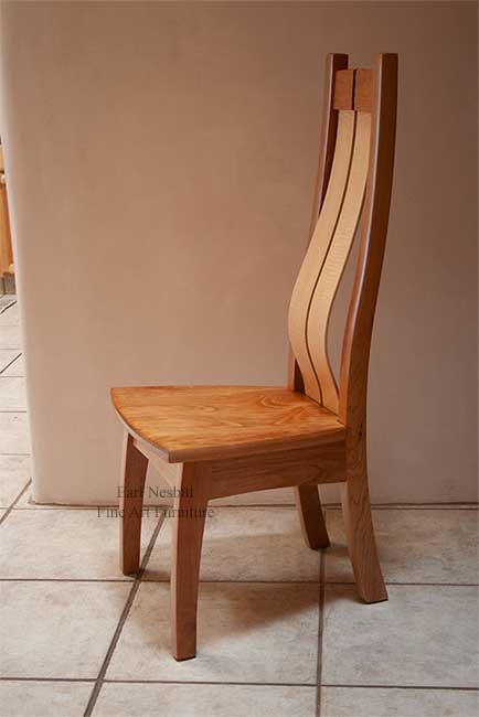 custom chair with sculpted cherry seat showing curve in slats